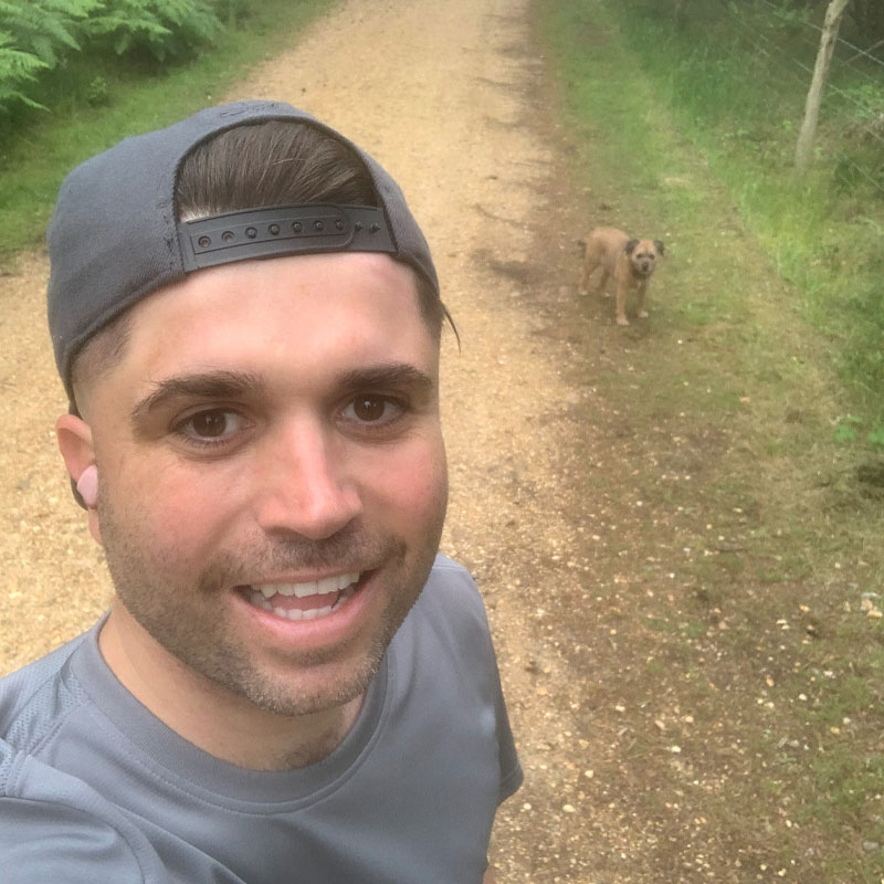 Photo of Alec Castiglione walking his dog