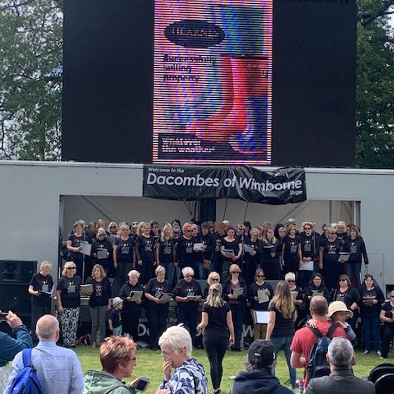 Photo of Linda Nairn performing in a choir