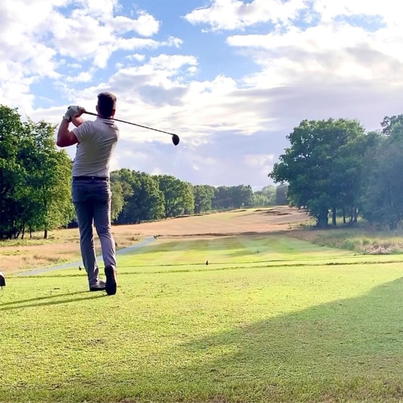 Photo of Sam Holtom playing golf